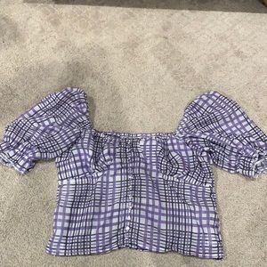 A purple plaid crop top